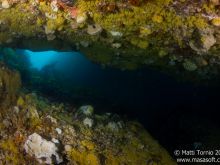 Under a ledge
