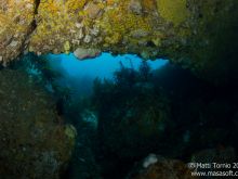 Under a ledge